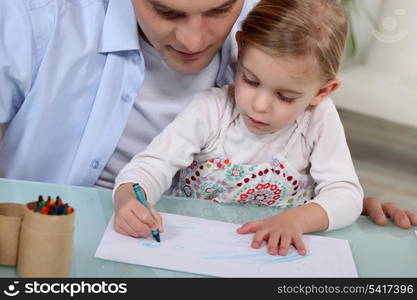 Father and daughter drawing