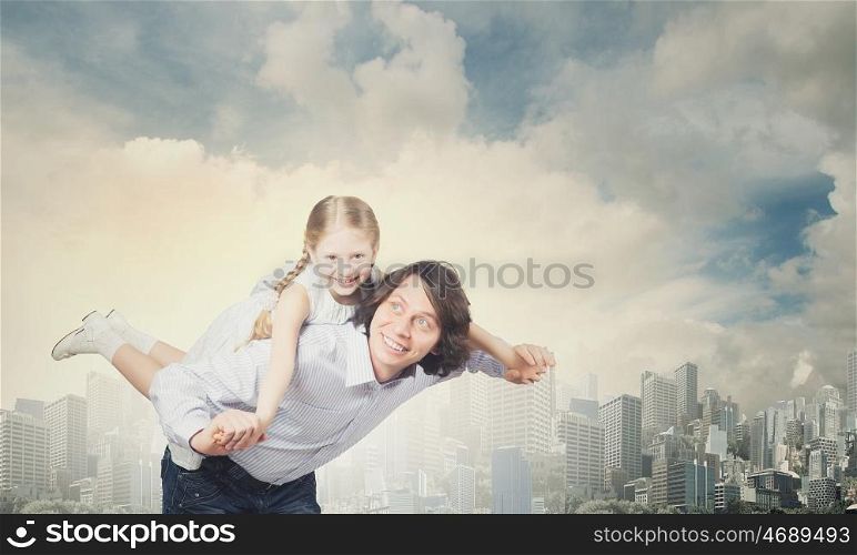 Father and daughter. Happy family of smiling father and daughter