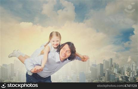 Father and daughter. Happy family of smiling father and daughter