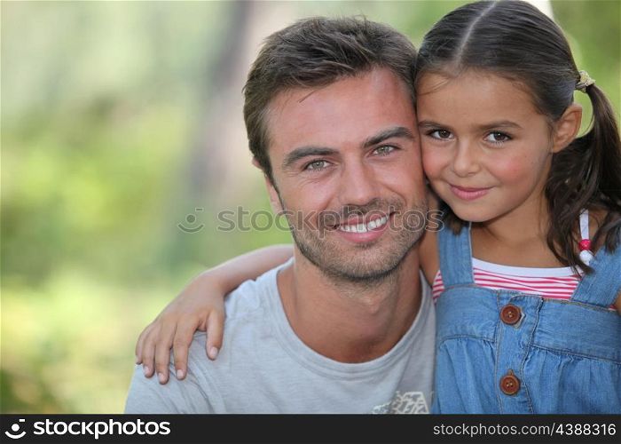 Father and daughter in the park