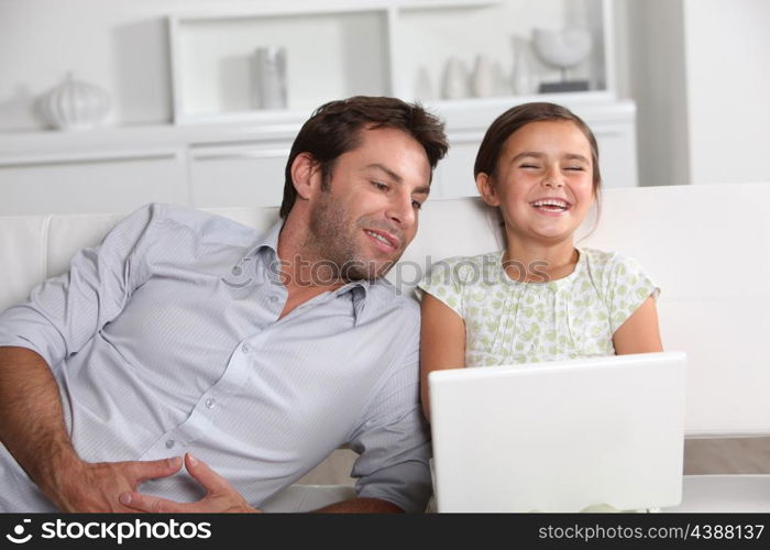 Father and daughter laughing