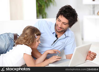 Father and daughter on the sofa