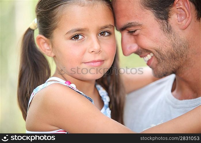 Father and daughter sharing a moment together