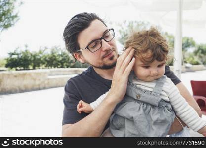 Father and daughter spending good time together in summer vacation