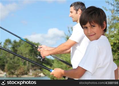 father and his little boy fishing