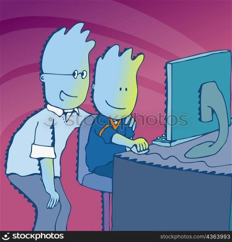 Father and his son in front of a computer