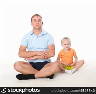father and little daughter doing sport together