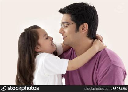 Father and little daughter hugging
