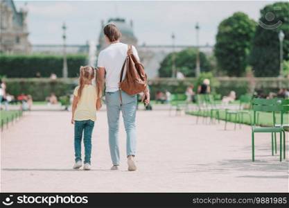 Father and little girl in European city, Paris, France. French summer holidays, travel and people concept.. Family in European city, Paris, France. French summer holidays, travel and people concept.