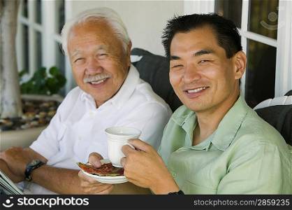 Father and Son Drinking Coffee