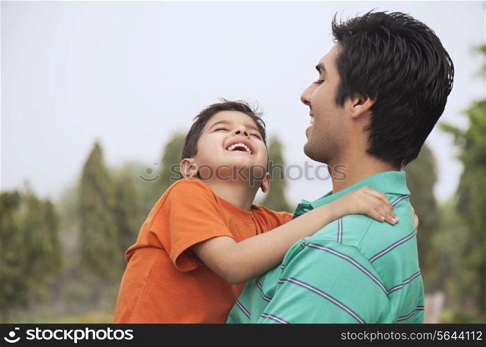 Father and son enjoying outdoors