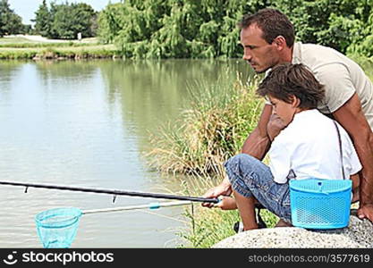 Father and son fishing together