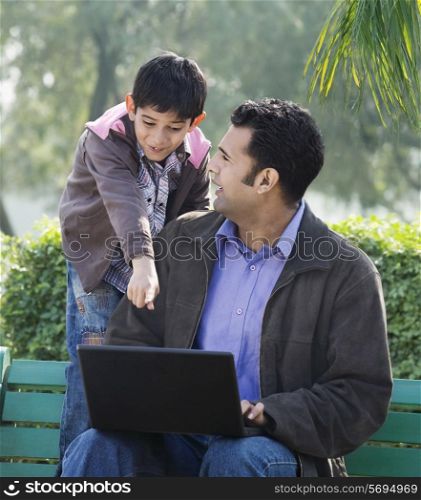 Father and son in a park