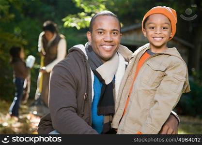 Father and son in garden
