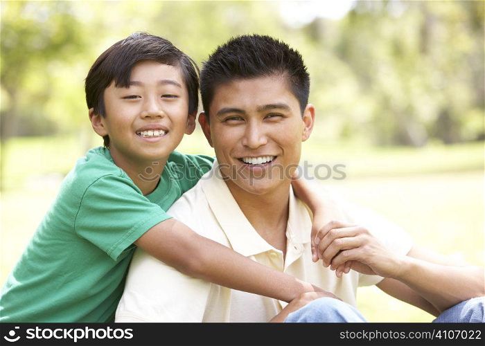 Father And Son In Park