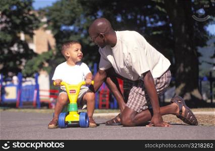 Father and Son in Playground
