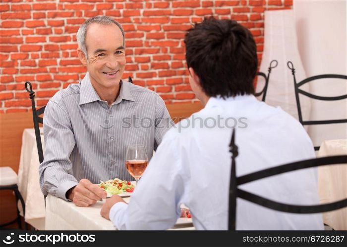 Father and son in the restaurant