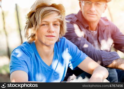 Father and son in vineyard. Father and son together in vineyard