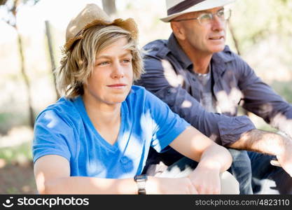 Father and son in vineyard. Father and son together in vineyard