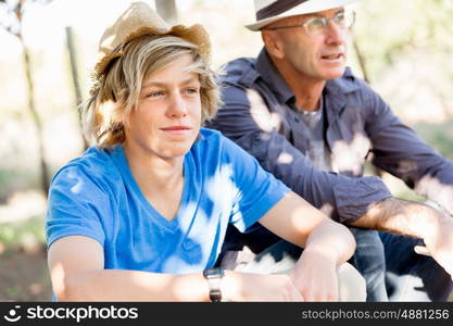 Father and son in vineyard. Father and son together in vineyard