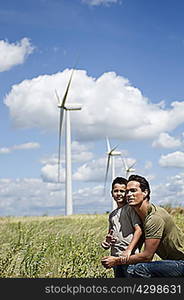 Father and son on a windfarm