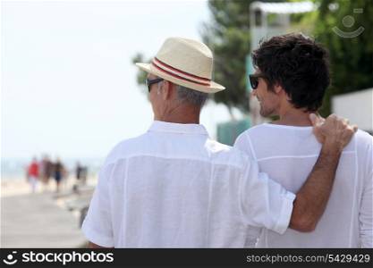 Father and son on boardwalk