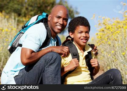 Father and son on country hike
