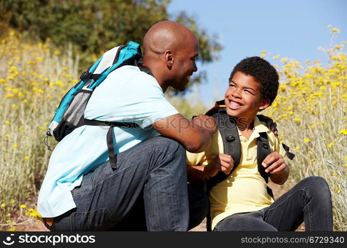 Father and son on country hike