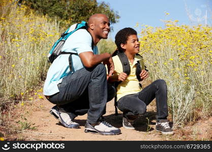 Father and son on country hike