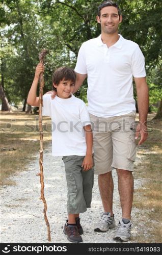 Father and son walking in the countryside
