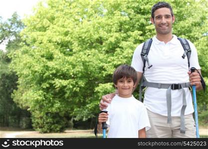 father and son walking in the park