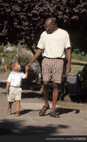 Father and Son Walking Together