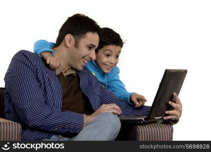 Father and son with a laptop