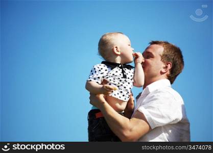 father and take son in blue sky