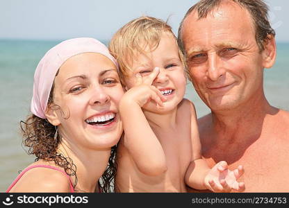 Father, daughter and granddaughter