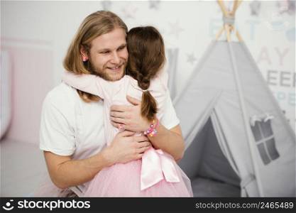 father daughter hugging home