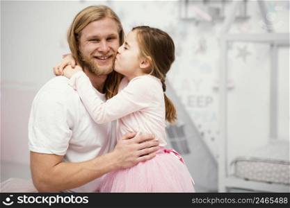 father daughter hugging home with copy space