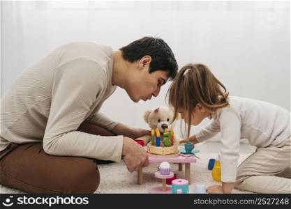 father daughter with toys home