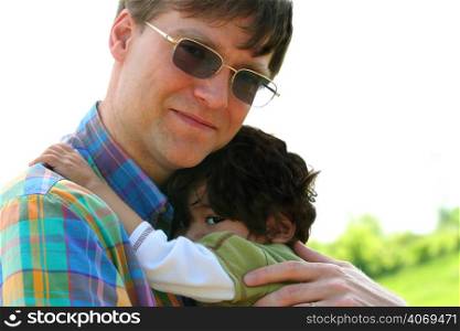 Father holding child
