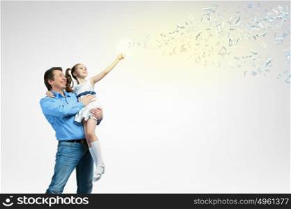 Father holding on hands daughter. Image of happy father holding on hands daughter