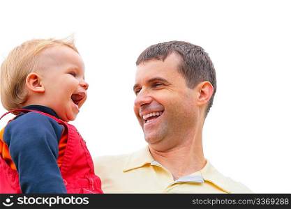 father holds child on hands and laugh