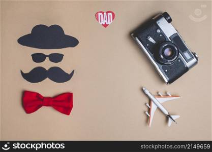 father s day composition with decorative red bow tie