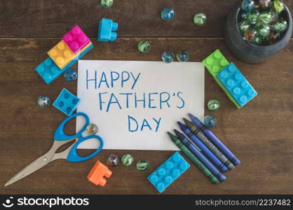 father s day composition with scissors toys