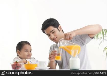 Father serving breakfast