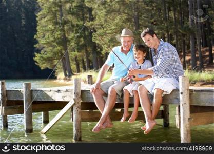 Father,son and grandson fishing together