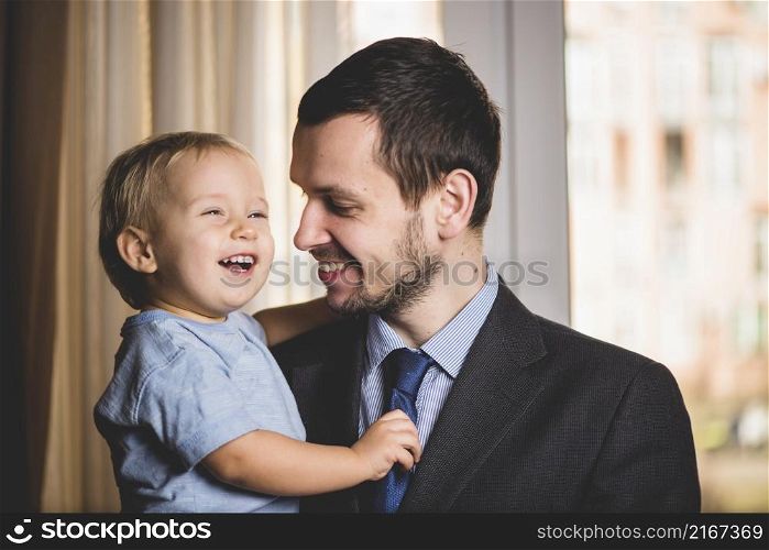father son laughing