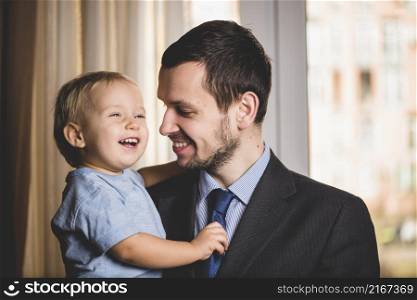 father son laughing