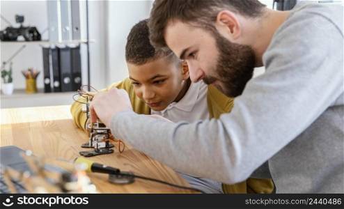 father son making robot 6