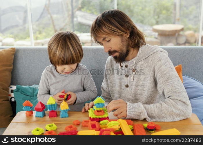 father son playing together