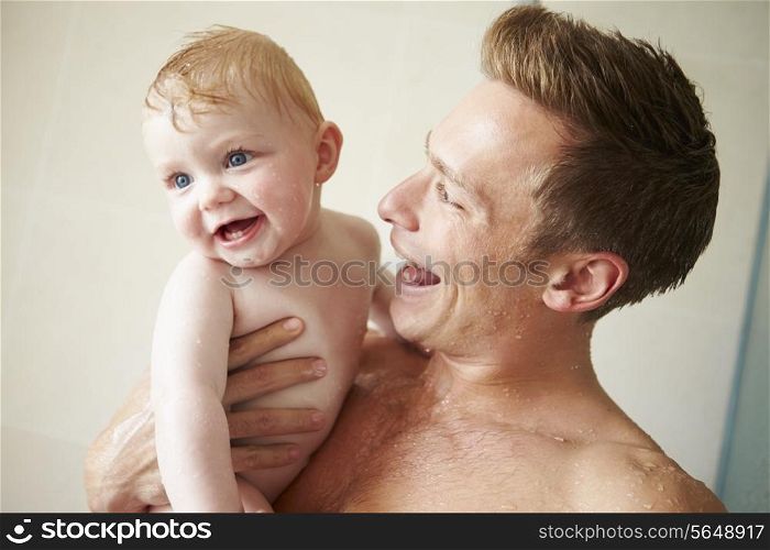 Father Taking Shower With Baby Son